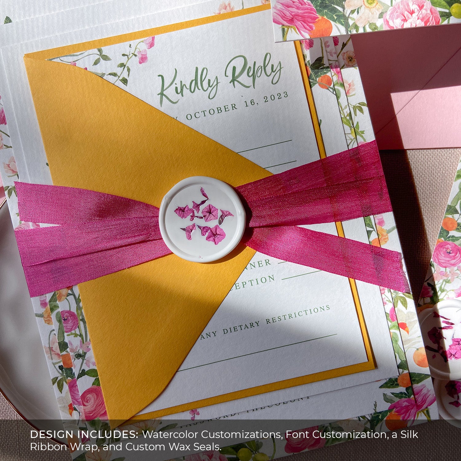 Customized, hot pink version of the Wild Flora Wedding Invitations with Watercolor Customizations, Font Customization, a Silk Ribbon Wrap, and Custom Wax Seals.